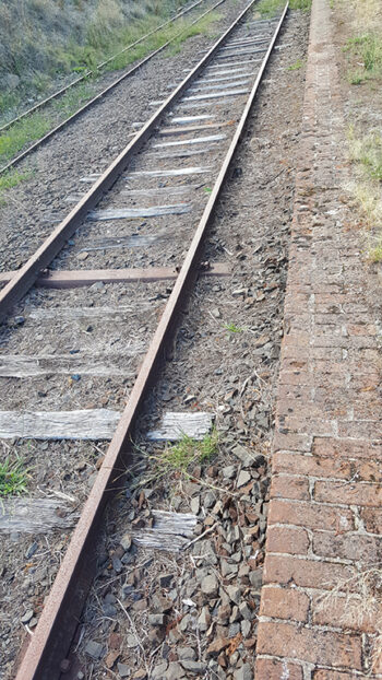 Old railway tracks from old platform at Carcoar, NSW by Jennifer Mosher - thumbnail