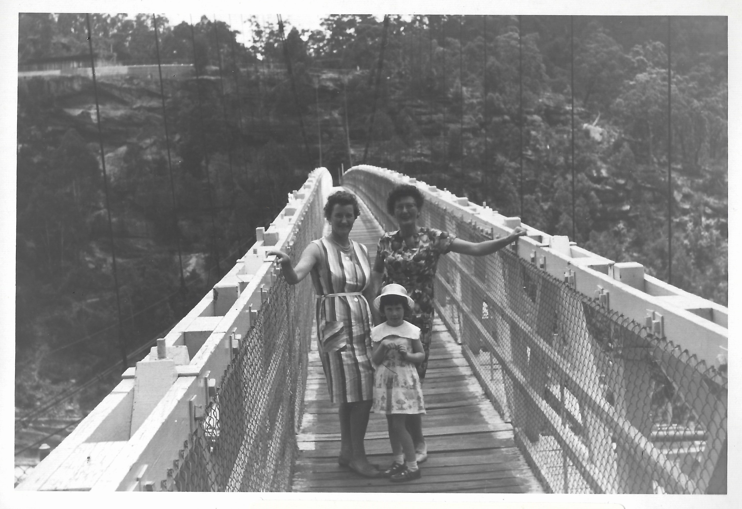 Margaret Butler, Dorothy Redwood and Jennifer (Butler) Mosher on suspension bridge, Warragamba Dam, 1965